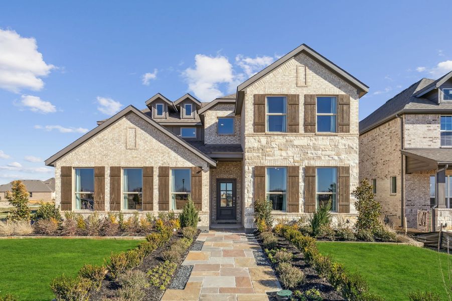Front exterior of a home in the Redden Farms community, located in Midlothian, TX (Image 2). Front exterior of a home in the Redden Farms community, located in Midlothian, TX (Image 2).