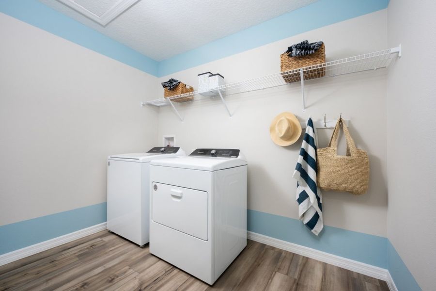 Furnished interior in a model home at Davis Landing in Wimauma (Image 12).
