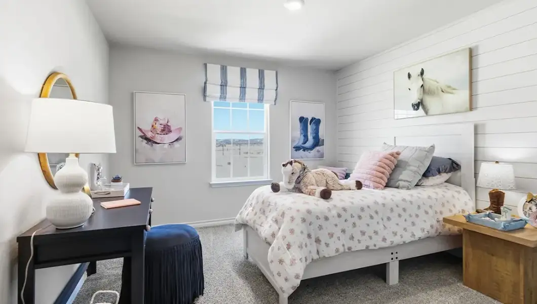 Furnished interior in a model home at The Woodlands at Medina Hills in Mico (Image 20).