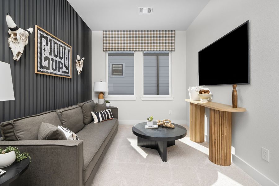Furnished interior in a model home at Symphony in Montgomery (Image 12).