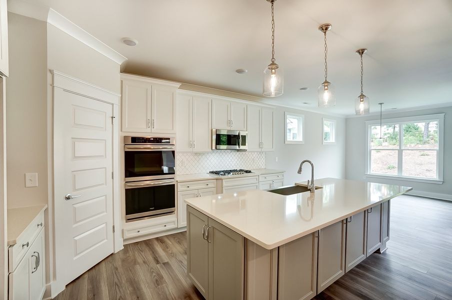 Furnished interior in a model home at Grove Park in Clemmons (Image 26).