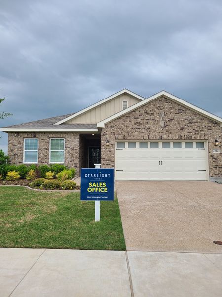A charming brick home with a spacious driveway in Meadow Park by Starlight Homes, Melissa, TX. A charming brick home with a spacious driveway in Meadow Park by Starlight Homes, Melissa, TX.