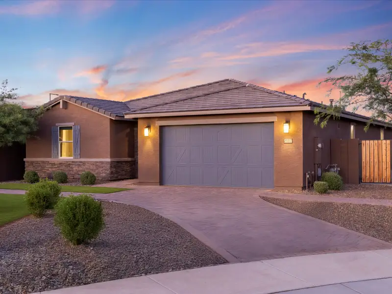 Front exterior of a home in the Paloma Creek - Signature Series community, located in Surprise, AZ (Image 3).