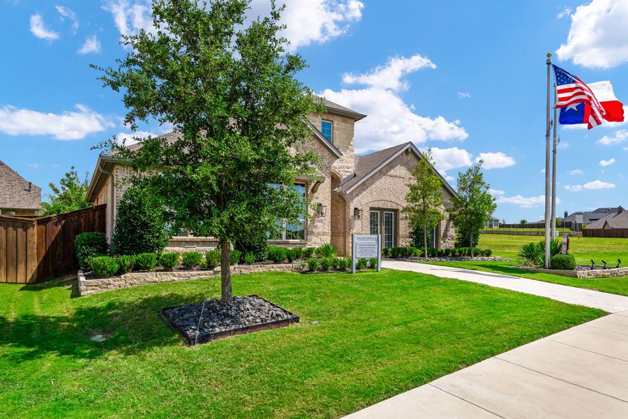 Plan 1685 Front Elevation Representative Photo by American Legend Homes