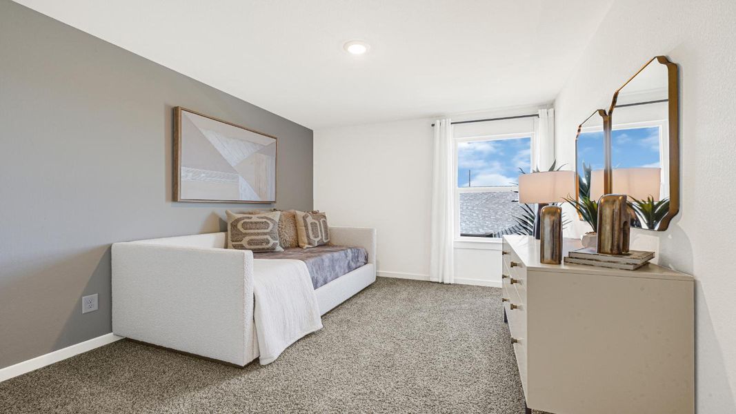 Furnished interior in a model home at Westward Pointe in Sealy (Image 29).