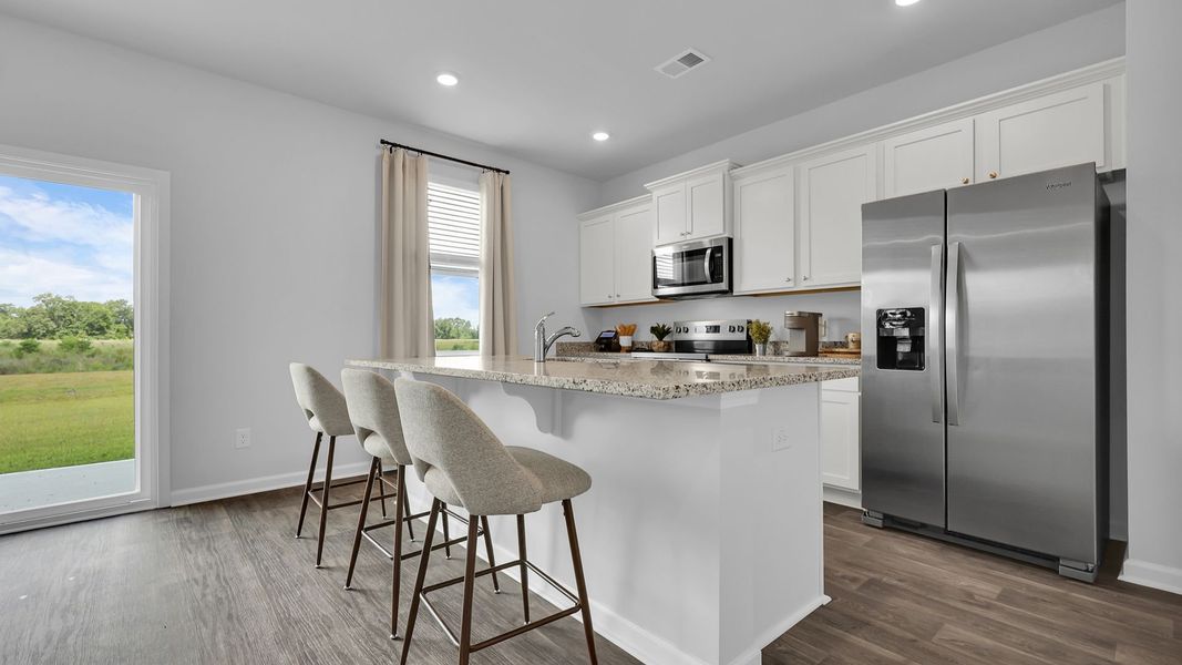 Furnished interior in a model home at The Ranch in Holly Hill (Image 2).