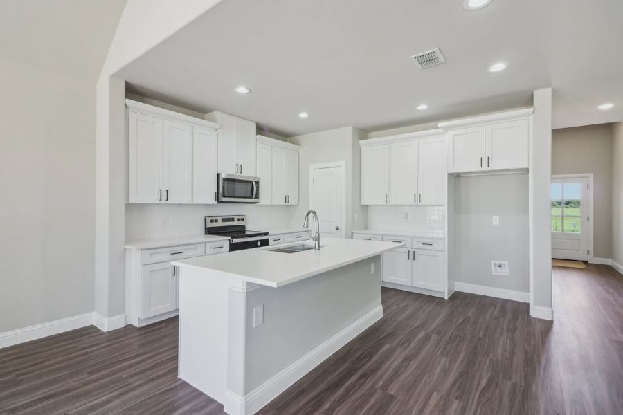 Furnished interior in a model home at Covenant Springs in Springtown (Image 5).