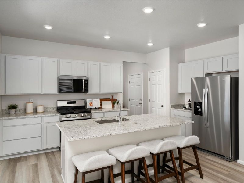 Furnished interior in a model home at Lake Bluff in Greeley (Image 4).