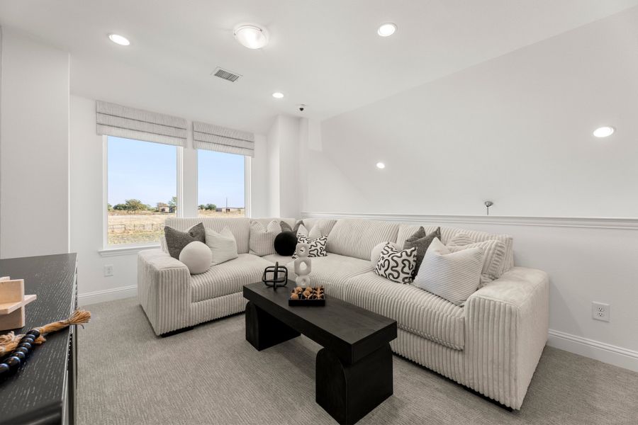 Furnished interior in a model home at South Meadow in Melissa (Image 29).