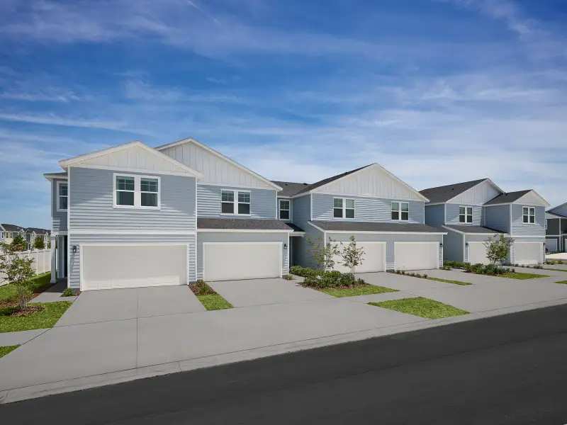 Front exterior of a home in the The District at Oakleaf - The Grove community, located in Middleburg, FL (Image 2).