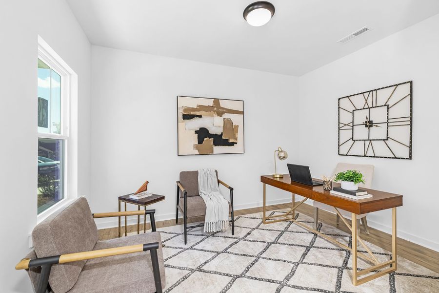 Furnished interior in a model home at Parc Northwest in Elon (Image 4).