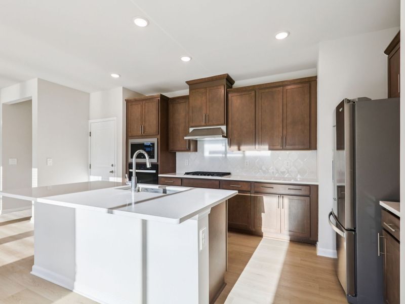 Furnished interior in a model home at Country Lane - Classic Series in Clayton (Image 2).