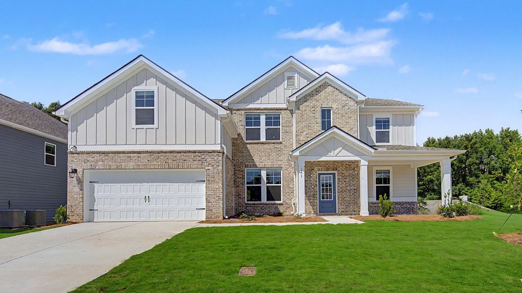 Front exterior of a home in the Northcroft community, located in Loganville, GA (Image 4).