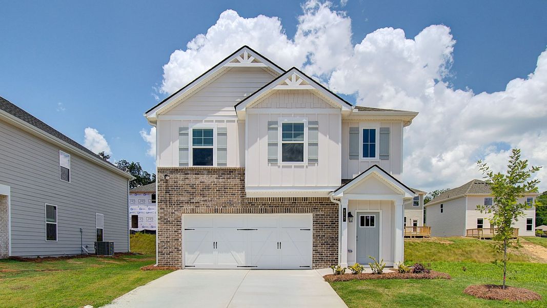 Front exterior of a home in the Enclave at Evergreen community, located in Fairburn, GA (Image 13). Front exterior of a home in the Enclave at Evergreen community, located in Fairburn, GA (Image 13).