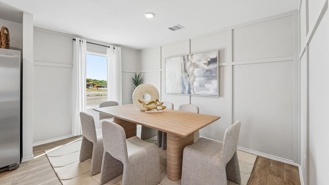 Furnished interior in a model home at Marigold in Kyle (Image 17).