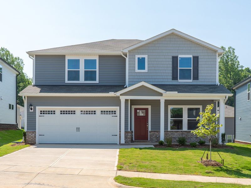 Front exterior of a home in the Oak Manor - Signature Series community, located in Garner, NC (Image 2).