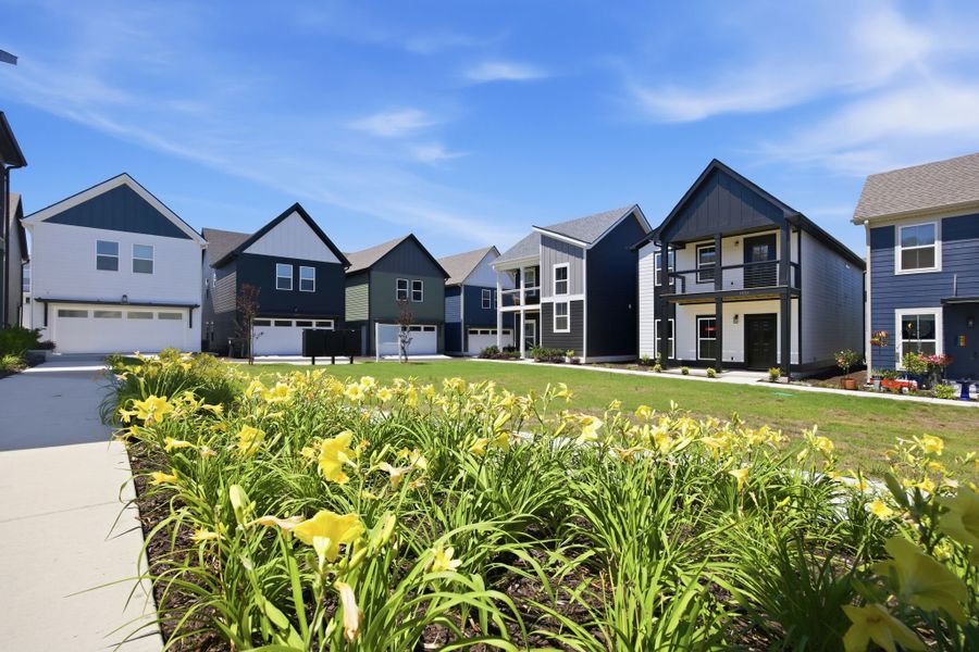 Residents enjoy shared green spaces and gathering areas designed to encourage connection and outdoor living at The Parks of Mill Town.