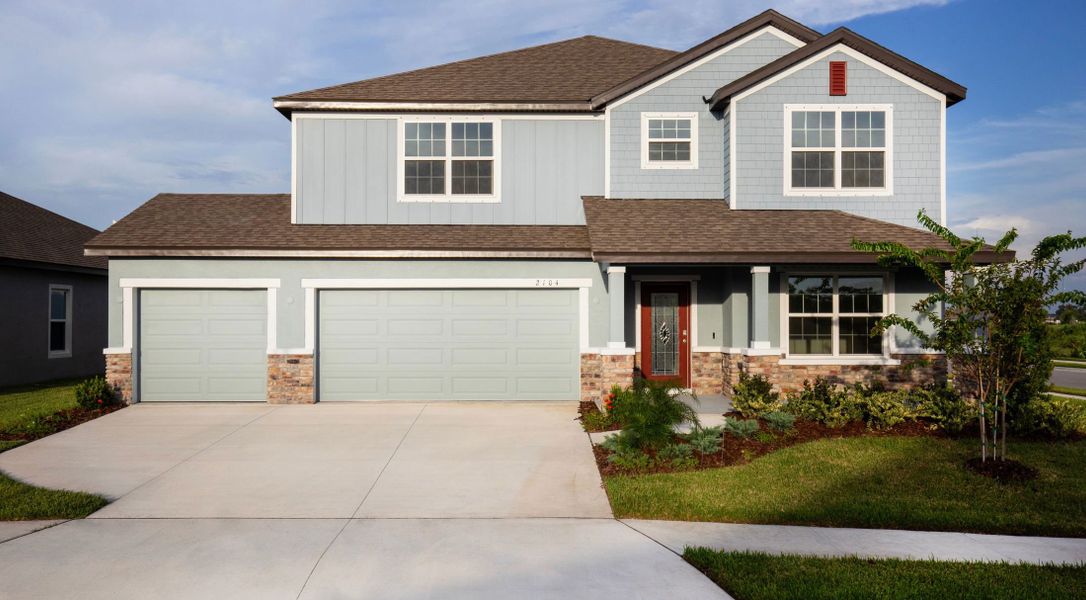 Front exterior of a home in the Egrets Landing community, located in Merritt Island, FL (Image 4).