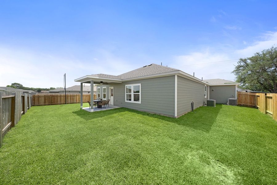 A house with a fence around it.