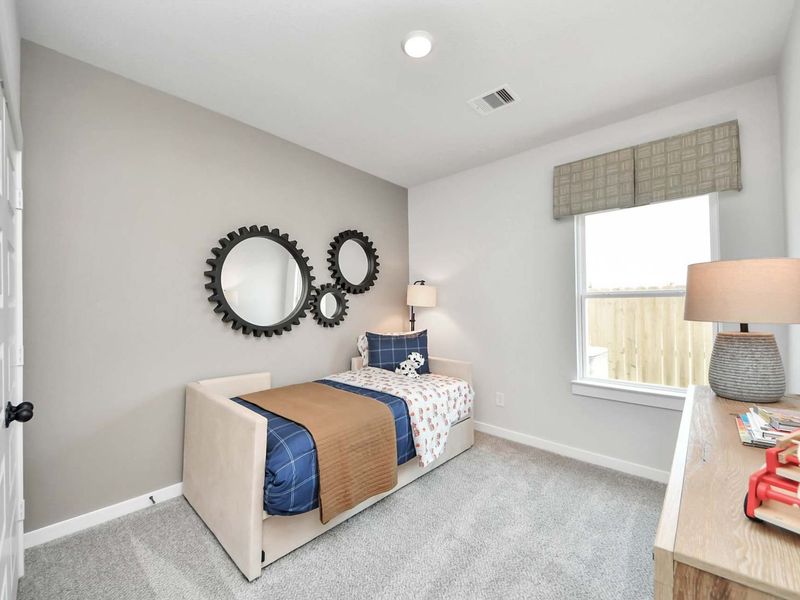 Furnished interior in a model home at Enclave at Newport in Crosby (Image 17).
