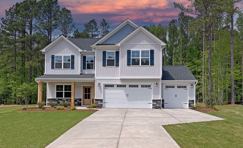 Front exterior of a home in the Magnolia Acres community, located in Fuquay Varina, NC (Image 11). Front exterior of a home in the Magnolia Acres community, located in Fuquay Varina, NC (Image 11).