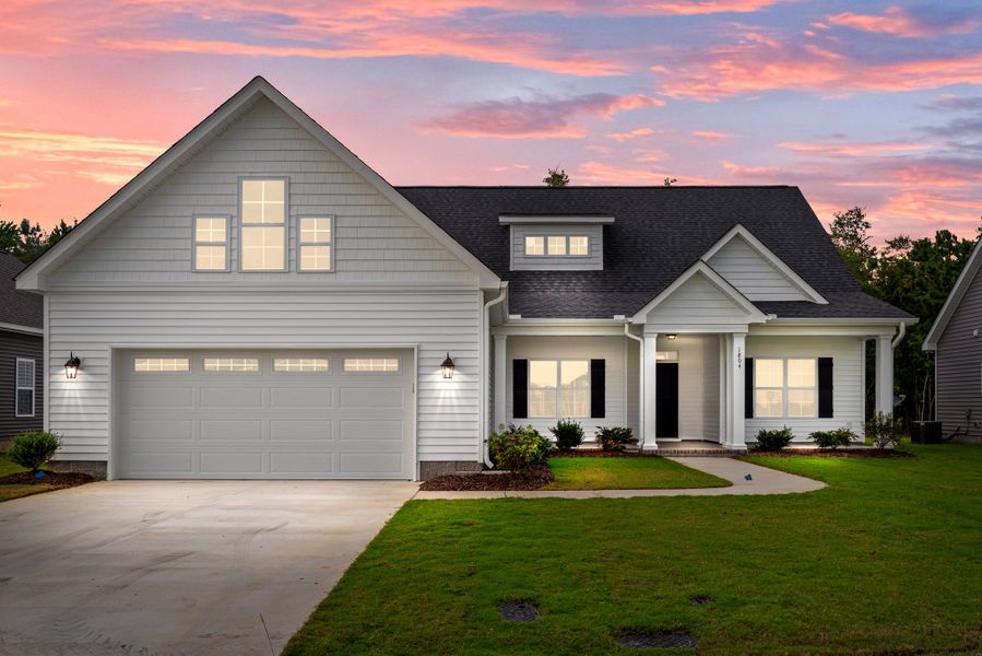 Front exterior of a home in the The Villas at Langston Farms community, located in Winterville, NC (Image 9).