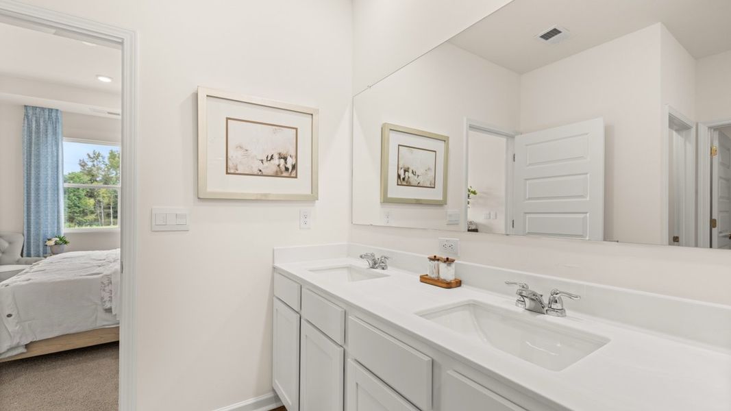 Furnished interior in a model home at Champion's Run in Lithonia (Image 28).