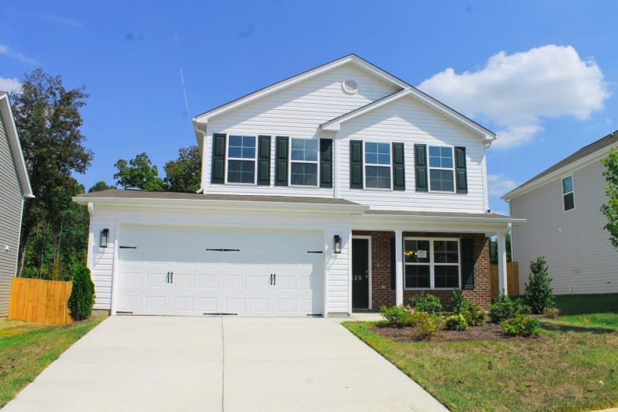 Front exterior of a home in the The Wilcox community, located in Greensboro, NC (Image 18).