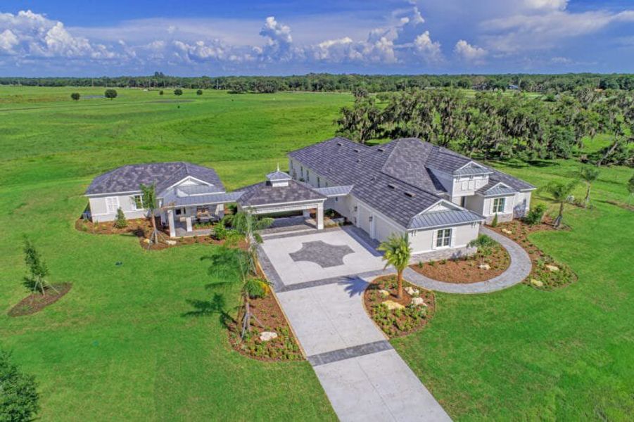 Front exterior of a home in the Hampton Lakes community, located in Sarasota, FL (Image 38). Front exterior of a home in the Hampton Lakes community, located in Sarasota, FL (Image 38).