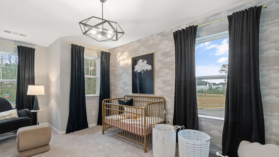 Furnished interior in a model home at McClure Farms Townhomes in Columbia (Image 19).