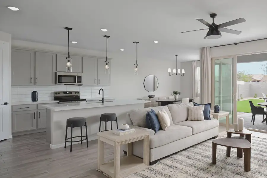 Furnished interior in a model home at Sunset Farms in Tolleson (Image 10).