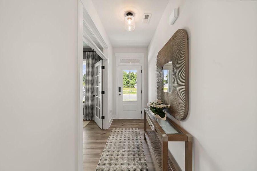 Furnished interior in a model home at Hayes Village in Greensboro (Image 9).