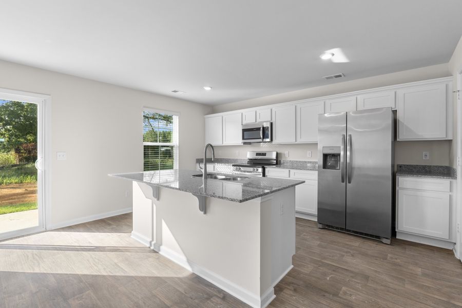 Furnished interior in a model home at Harmon Terrace in Hopkins (Image 27).