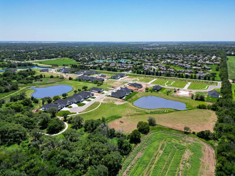Aerial view of the The Courtyards at Jacobs Farm community in Wichita, KS, showing layout and nearby surroundings (Image 19). Aerial view of the The Courtyards at Jacobs Farm community in Wichita, KS, showing layout and nearby surroundings (Image 19).