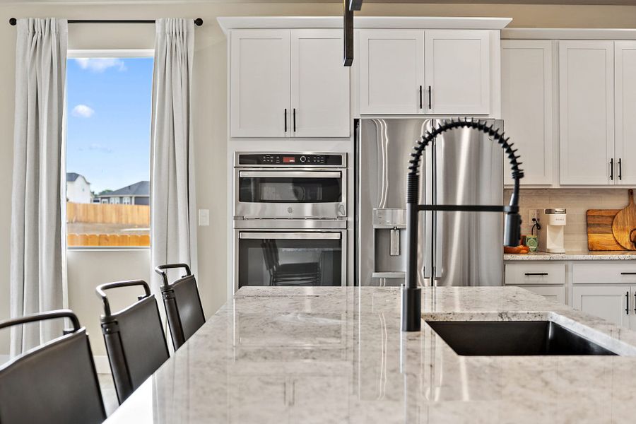 Furnished interior in a model home at The Glen-12 in Colorado Springs (Image 16).