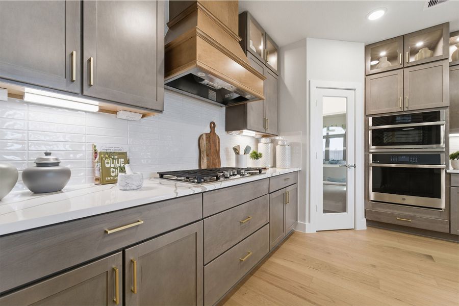 Furnished interior in a model home at Sundance Cove in Crosby (Image 37).