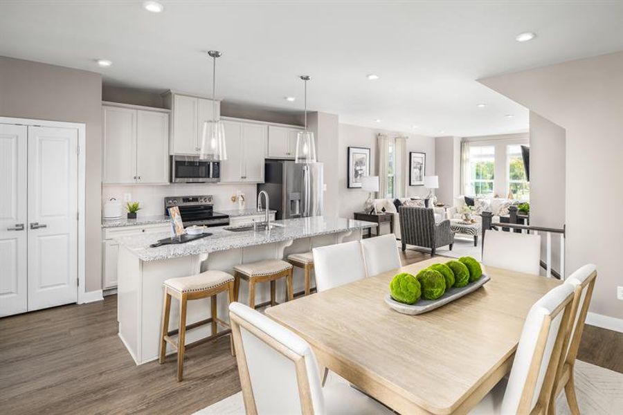 Modern, open-concept main levels with plenty of space for cooking, relaxing, and entertaining!