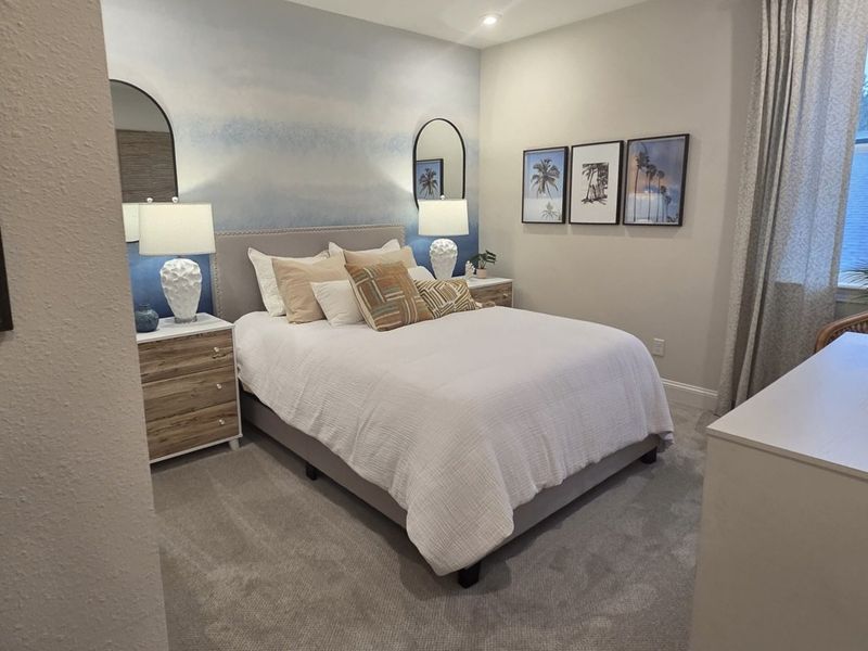 A cozy bedroom featuring soft hues, elegant decor, and stylish lighting, creating a serene and inviting atmosphere. A cozy bedroom featuring soft hues, elegant decor, and stylish lighting, creating a serene and inviting atmosphere.