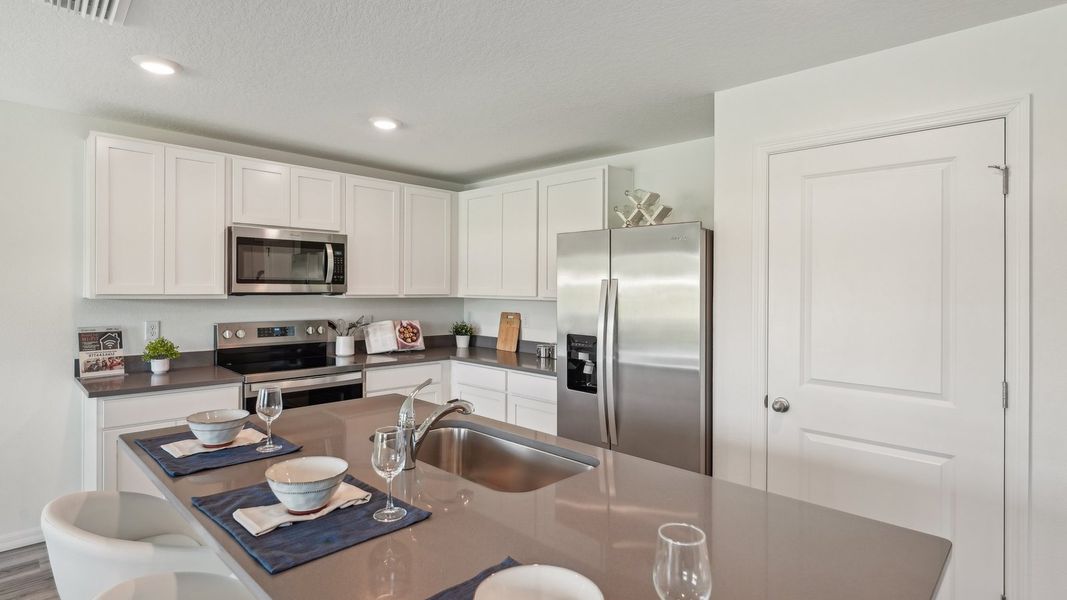 Furnished interior in a model home at Holloway Landing in Plant City (Image 16).