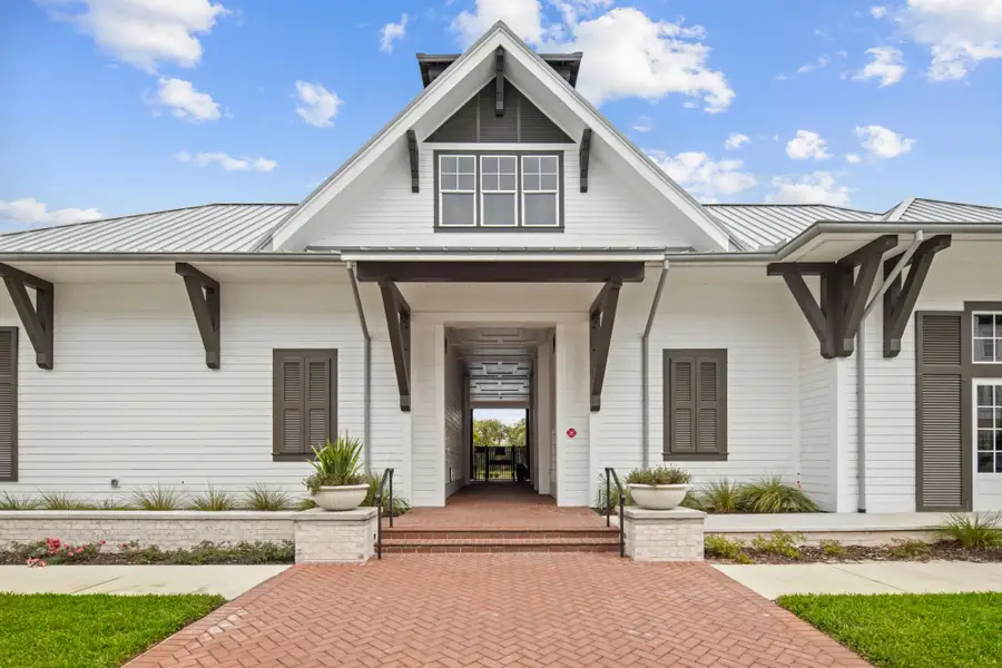 Front exterior of a home in the Celebration - Island Village community, located in Celebration, FL (Image 3). Front exterior of a home in the Celebration - Island Village community, located in Celebration, FL (Image 3).