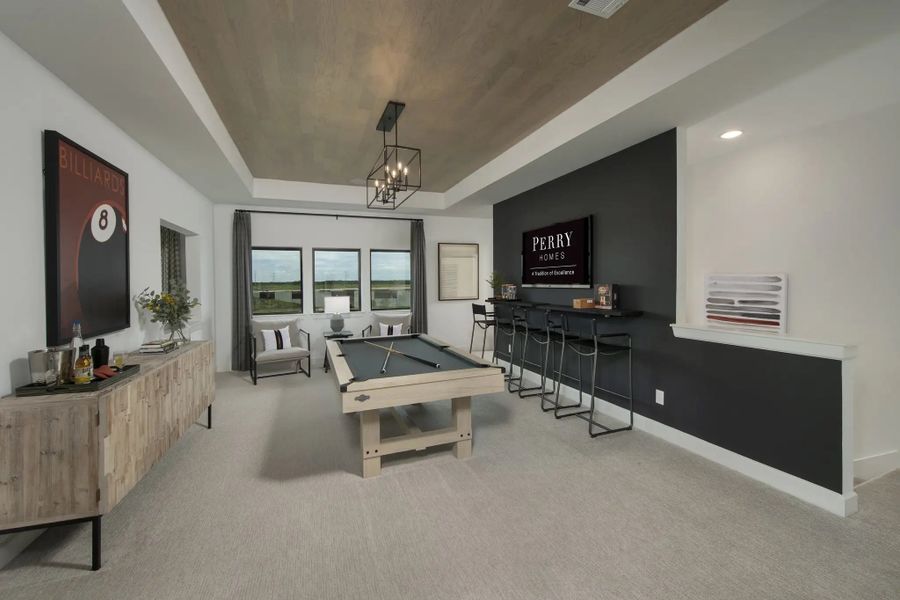 Furnished interior in a model home at Lakes Of Cane Island 80' in Katy (Image 8).