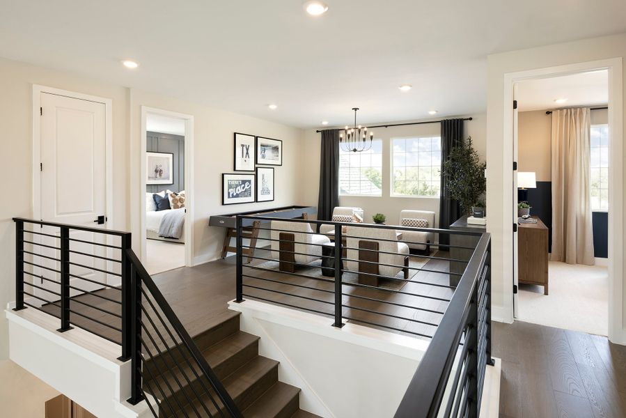 Furnished interior in a model home at Manors Collection - Freedom at Anthem in Kyle (Image 10).