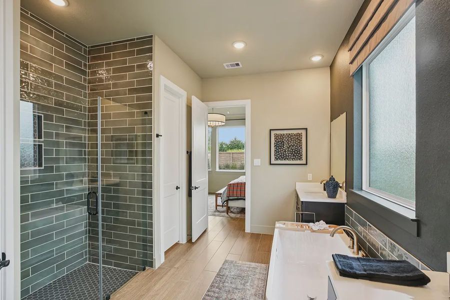 Furnished interior in a model home at Meridiana 50's in Manvel (Image 32).