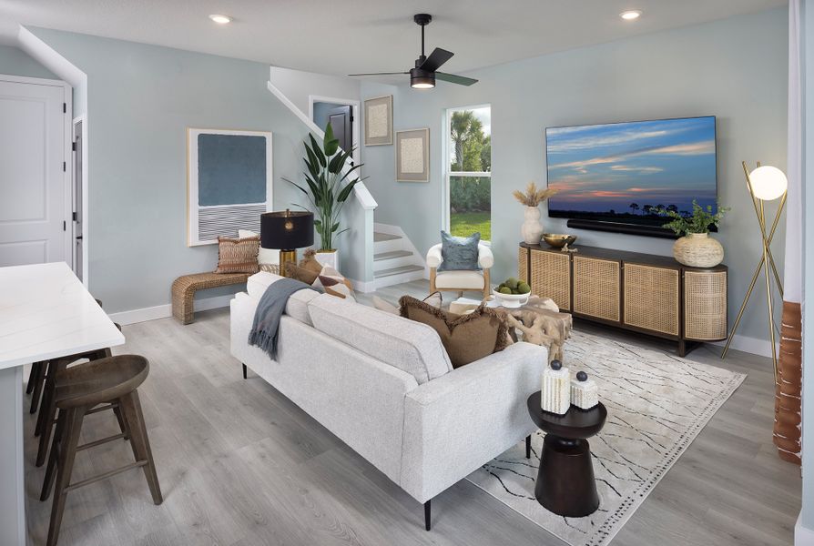 Furnished interior in a model home at Persimmon Place - Townhomes in Wesley Chapel (Image 6).