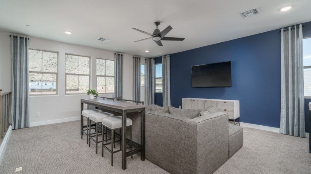 Furnished interior in a model home at The Ridge at Sienna Hills in Buckeye (Image 30).