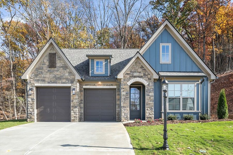 Front exterior of a home in the Nature's Cove community, located in Ooltewah, TN (Image 1). Front exterior of a home in the Nature's Cove community, located in Ooltewah, TN (Image 1).