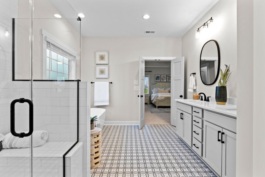 Furnished interior in a model home at Eli's Ridge in Winterville (Image 18).