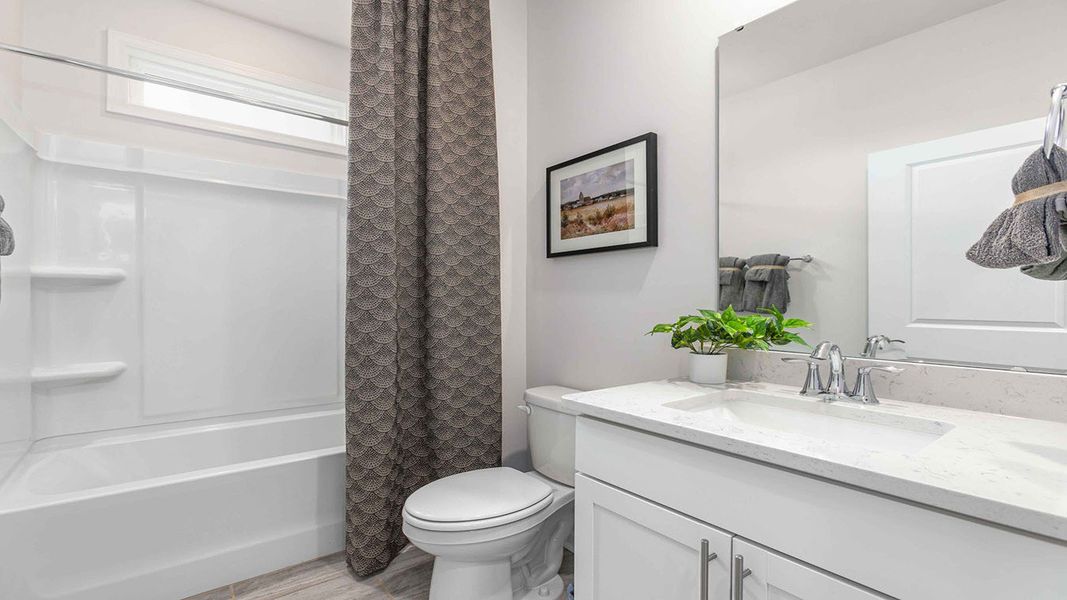 Furnished interior in a model home at The Villas at Kinsley in Jamestown (Image 7).