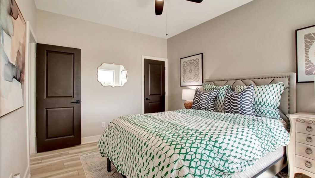 Furnished interior in a model home at Sunterra 40 in Katy (Image 42).