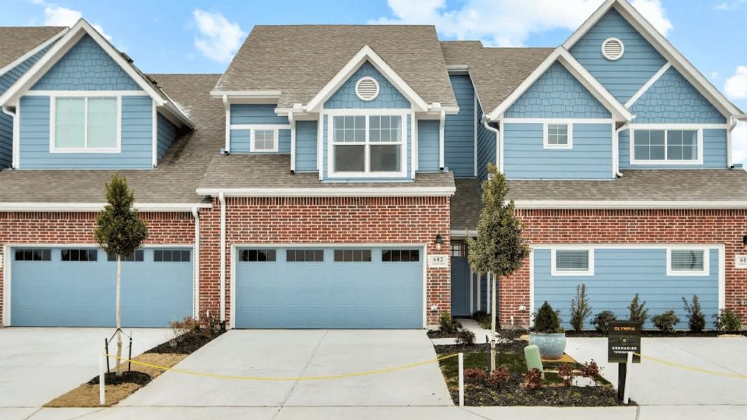 Front exterior of a home in the Woodbridge Townhomes community, located in Wylie, TX (Image 5).